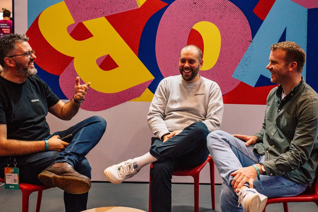 Andreas Gebhard with the founders of Hypecast at Web Summit 2024